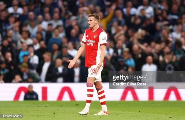 Rob Holding of Arsenal looks dejected after being shown a red card for a foul on Heung-Min Son of Tottenham Hotspur during the Premier League match...