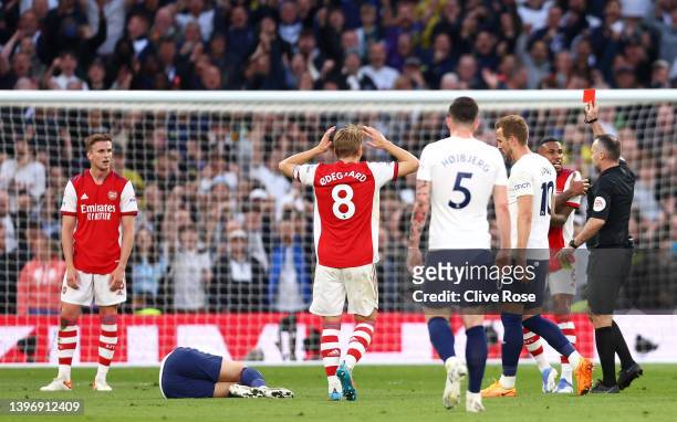 Rob Holding of Arsenal is shown a red card following a foul on Heung-Min Son of Tottenham Hotspur by Match Referee, during the Premier League match...