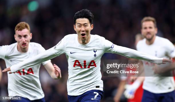 Heung-Min Son of Tottenham Hotspur celebrates after scoring their side's third goal during the Premier League match between Tottenham Hotspur and...