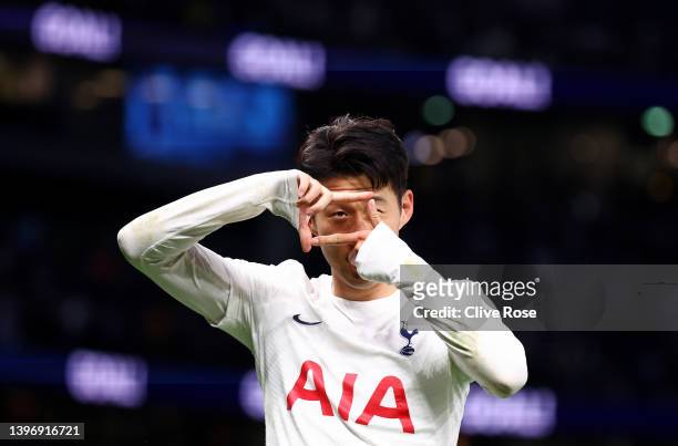 Heung-Min Son of Tottenham Hotspur celebrates after scoring their side's third goal during the Premier League match between Tottenham Hotspur and...