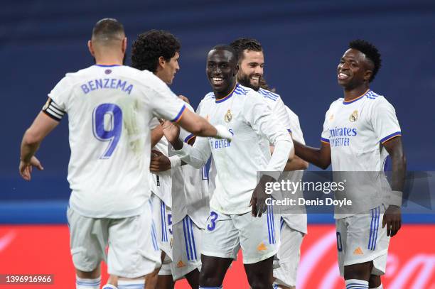 Ferland Mendy of Real Madrid celebrates with team mates after scoring their side's first goal during the La Liga Santander match between Real Madrid...