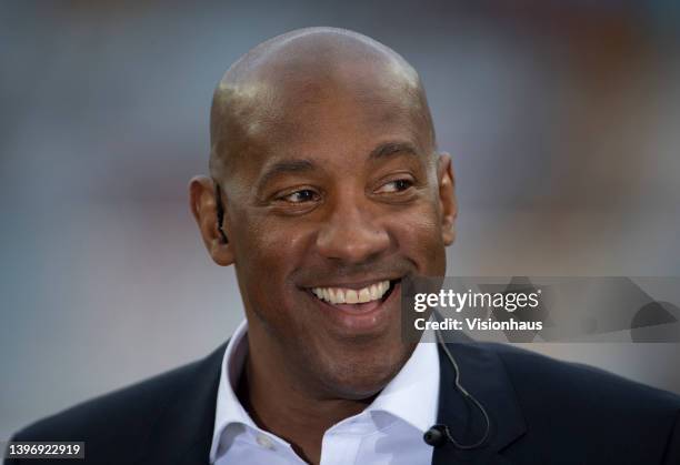 Sky television pundit Dion Dublin before the Premier League match between Aston Villa and Liverpool at Villa Park on May 10, 2022 in Birmingham,...