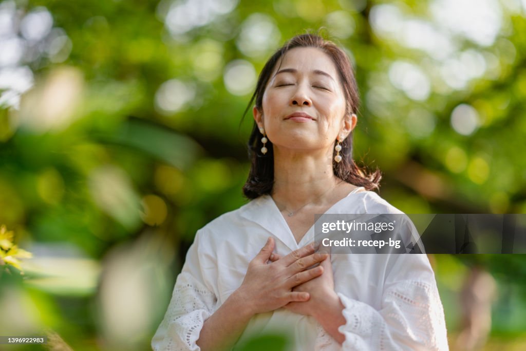 Woman meditating in nature