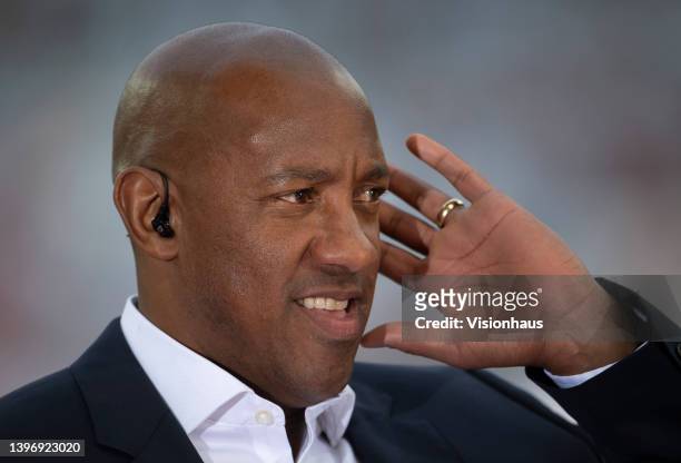 Sky television pundit Dion Dublin before the Premier League match between Aston Villa and Liverpool at Villa Park on May 10, 2022 in Birmingham,...