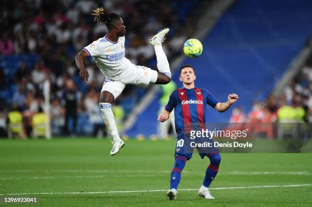 Eduardo Camavinga of Real Madrid controls the ball whilst under pressure from Enis Bardhi of Levante during the La Liga Santander match between Real...