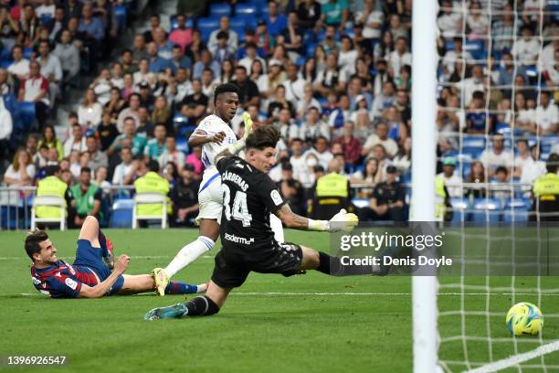 Vinicius Junior of Real Madrid scores their side's sixth goal during the La Liga Santander match between Real Madrid CF and Levante UD at Estadio...