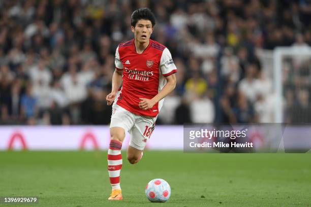 Takehiro Tomiyasu of Arsenal in act during the Premier League match between Tottenham Hotspur and Arsenal at Tottenham Hotspur Stadium on May 12,...