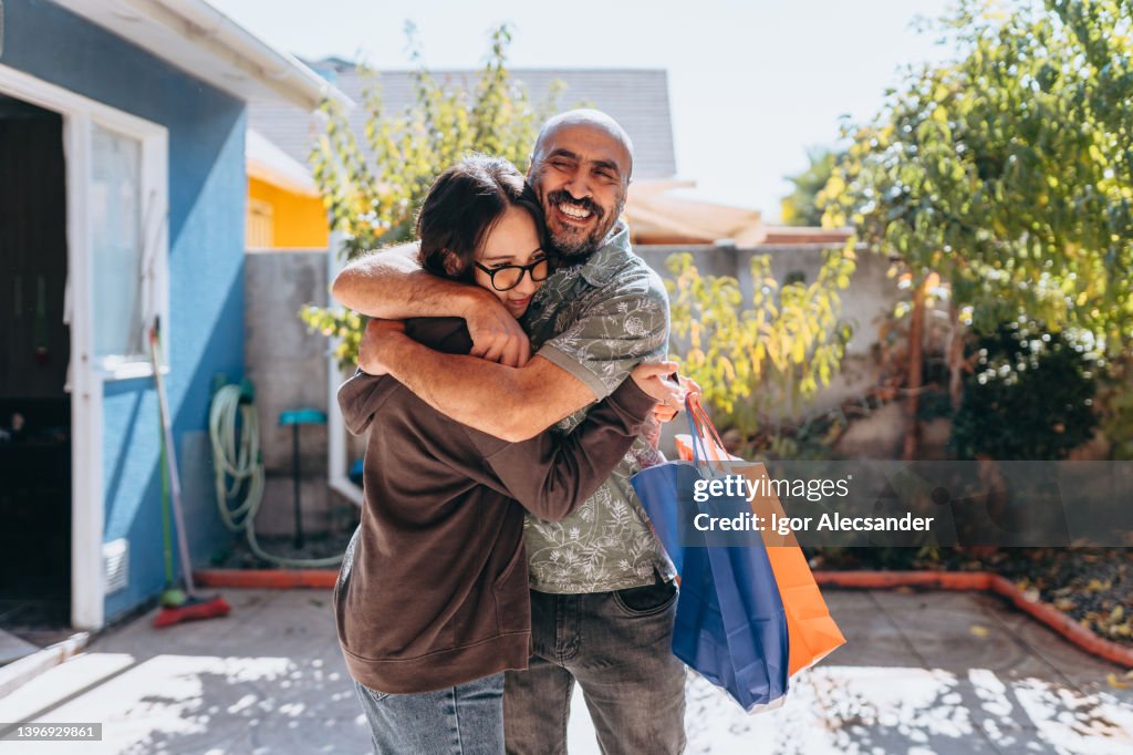 Father and daughter hugging