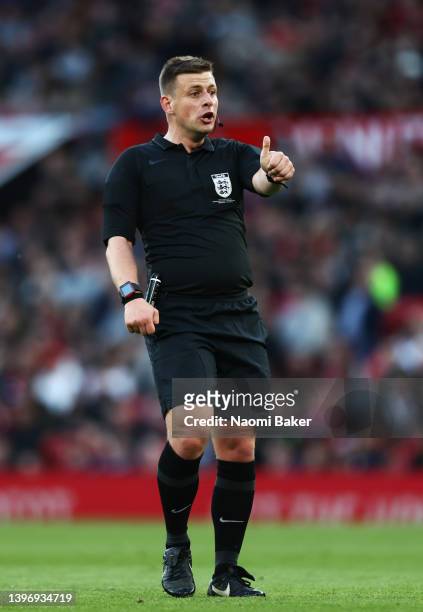 Referee Josh Smith in action during the FA Youth Cup Final match between Manchester United and Nottingham Forest at Old Trafford on May 11, 2022 in...