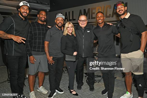 Montez Sweat, Jonathan Allen, Santana Moss, Renee Parsons, Bob Parsons, Terry McLaurin and Logan Thomas attend the PXG Fairfax Grand Opening...