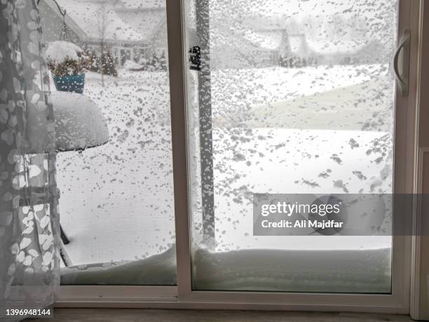 winter weather - storm outside window stock pictures, royalty-free photos & images