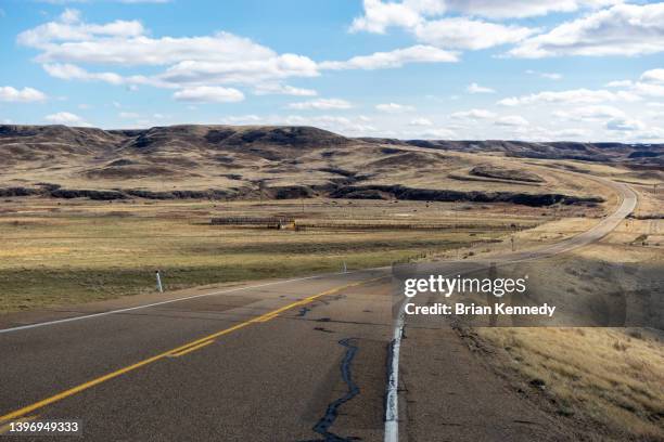 frenchman river valley down road - saskatchewan highway stock pictures, royalty-free photos & images