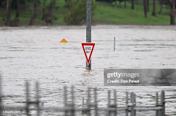 Road is inundated by floodwater on May 13, 2022 in Ipswich, Australia. Parts of southeast Queensland are on flood watch as the state continues to...