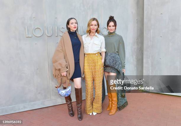 Iris Apatow, Leslie Mann, and Maude Apatow attends Louis Vuitton's 2023 Cruise Show at Salk Institute for Biological Studies on May 12, 2022 in San...