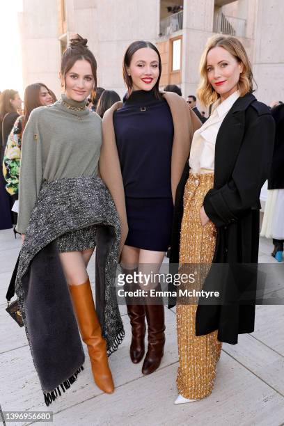 Maude Apatow, Iris Apatow, and Leslie Mann attend the Louis Vuitton's 2023 Cruise Show on May 12, 2022 in San Diego, California.