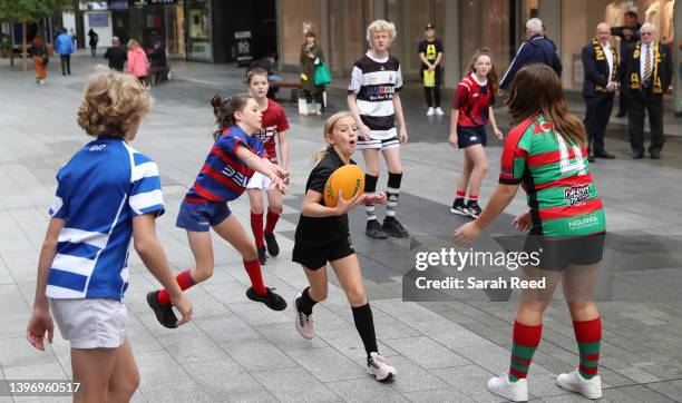 Young rugby players have a game on the Rundle Mall during a Rugby Australia media opportunity in support of the Rugby World Cup 2027 & 2029 bid, at...