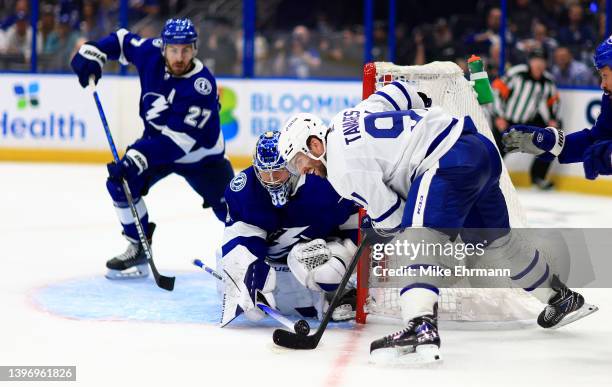 Andrei Vasilevskiy of the Tampa Bay Lightning stops a shot from John Tavares of the Toronto Maple Leafs in the third period during Game Five of the...