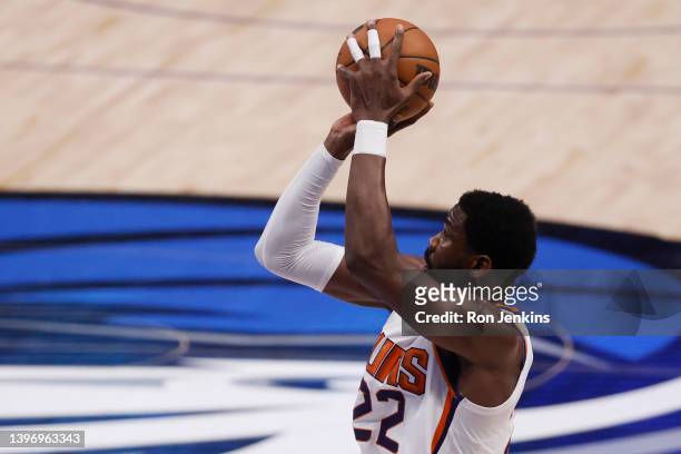 Deandre Ayton of the Phoenix Suns shoots the ball against the Dallas Mavericks in the first quarter of Game Six of the 2022 NBA Playoffs Western...