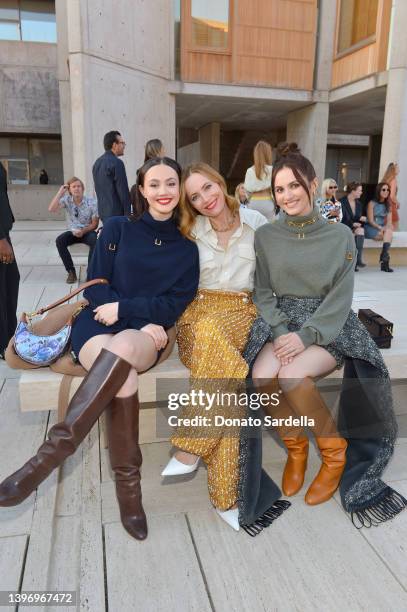 Iris Apatow, Leslie Mann, and Maude Apatow attend Louis Vuitton's 2023 Cruise Show at Salk Institute for Biological Studies on May 12, 2022 in San...