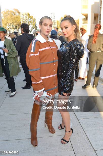 Emma Roberts and Billie Lourd attend Louis Vuitton's 2023 Cruise Show at Salk Institute for Biological Studies on May 12, 2022 in San Diego,...