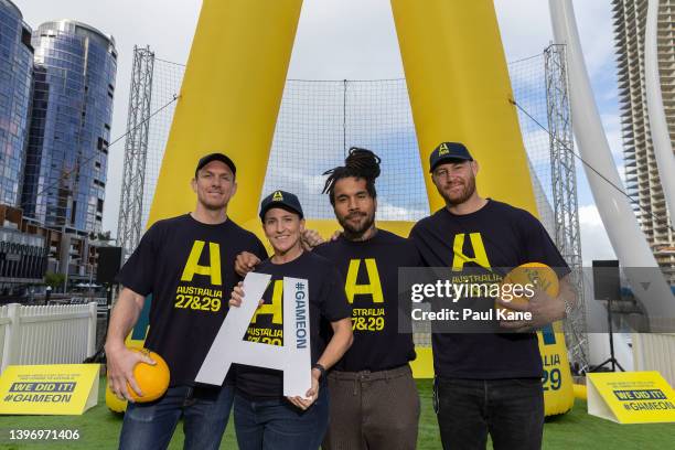 Classic Wallabies Dane Haylett-Petty, Digby Ioane and Scott Higginbotham pose with Classic Wallaroo Selena Tranter during a Rugby Australia media...