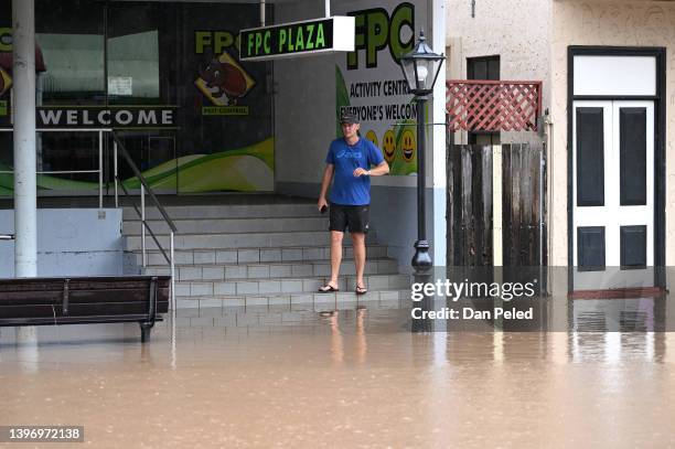 Man inspects floodwater on May 13, 2022 in Laidley, Australia. Parts of southeast Queensland are on flood watch as the state continues to experience...