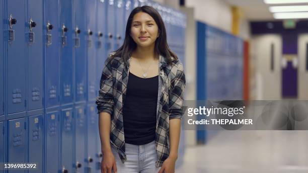 smiley fifteen years old teenage girl school portrait - 14 15 years girls stockfoto's en -beelden