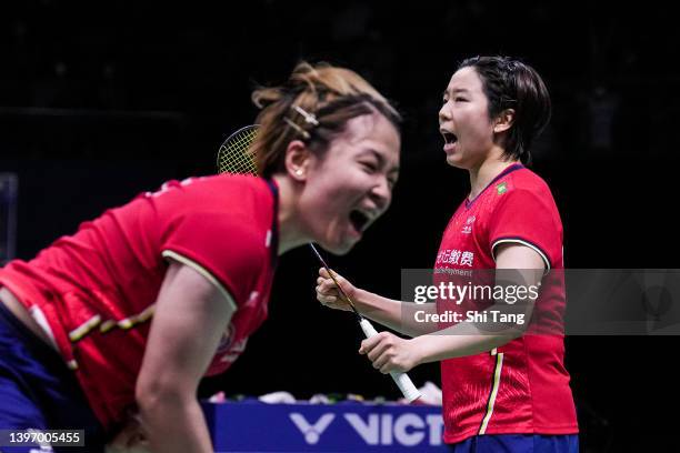 Chen Qingchen and Jia Yifan of China celebrate the victory in the Uber Cup Semi Final Women's Doubles match against Rawinda Prajongjai and...