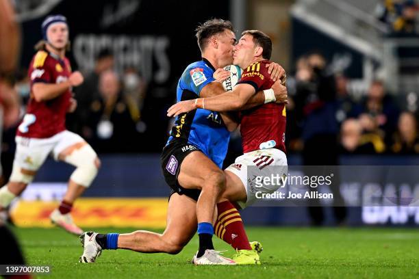 Richard Kahui of the Force tackles Mitch Hunt of the Highlanders during the round 13 Super Rugby Pacific match between the Highlanders and the...