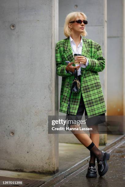 Kika Lateef wearing Blanca, Djerf Avenue, h&m, Vintage Gucci at Afterpay Australian Fashion Week 2022 on May 13, 2022 in Sydney, Australia.