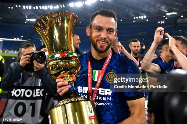 Stefan de Vrij of FC Internazionale celebrates with the trophy at the end of the Italy Cup final football match between Juventus FC and FC...