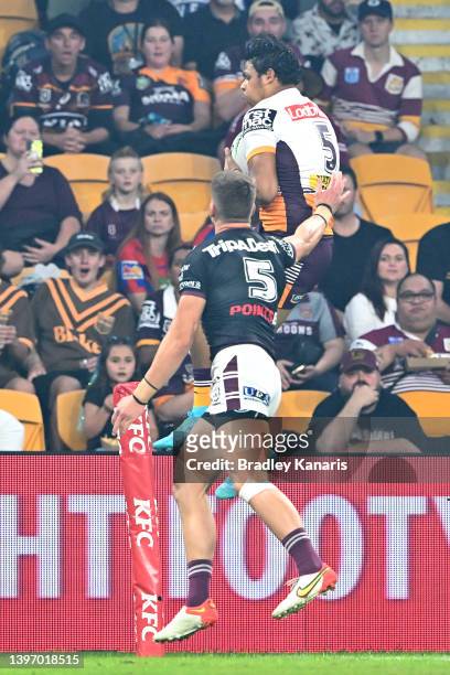 Selwyn Cobbo of the Broncos wins the ball before scoring a try during the round 10 NRL match between the Manly Sea Eagles and the Brisbane Broncos at...