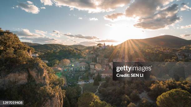 mountain rocks of the circus of dolomites of mourèze at sunset, in the hérault occitanie france - hérault stock-fotos und bilder