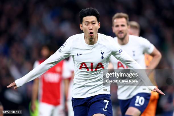 Heung-Min Son of Tottenham Hotspur celebrates after scoring their side's third goal during the Premier League match between Tottenham Hotspur and...