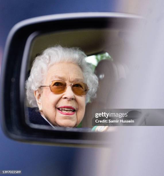 Queen Elizabeth II arrives at The Royal Windsor Horse Show at Home Park on May 13, 2022 in Windsor, England. The Royal Windsor Horse Show, which is...