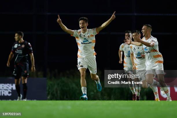 Luke Ivanovic of the Roar celebrates a goal with team mates during the Australia Cup Playoff match between the Western Sydney Wanderers and the...