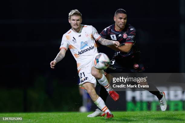 Nicholas Olsen of the Roar and Tate Russell of the Wanderers contest the ball during the Australia Cup Playoff match between the Western Sydney...