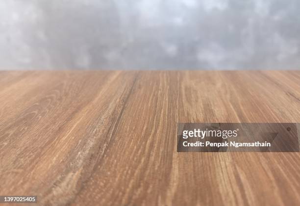 brown wooden floor and grey cement wall for display your product - holzwand shabby chic stock-fotos und bilder