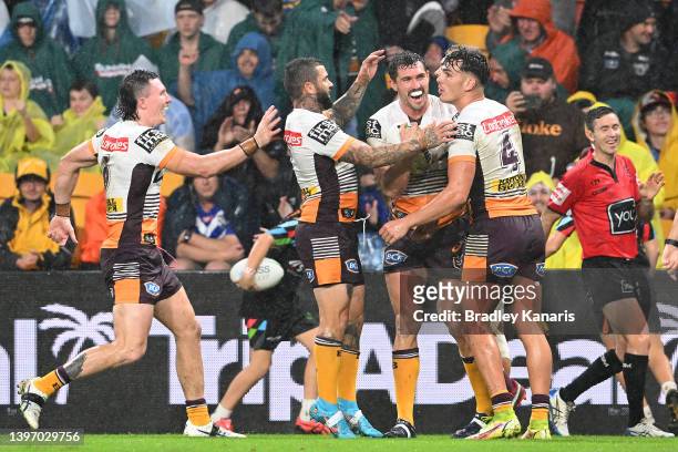 Corey Oates of the Broncos celebrates after scoring a try during the round 10 NRL match between the Manly Sea Eagles and the Brisbane Broncos at...