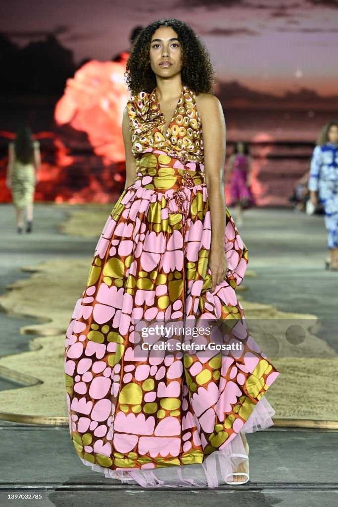 A model walks the runway in a design by Ikuntji Artists during the ...