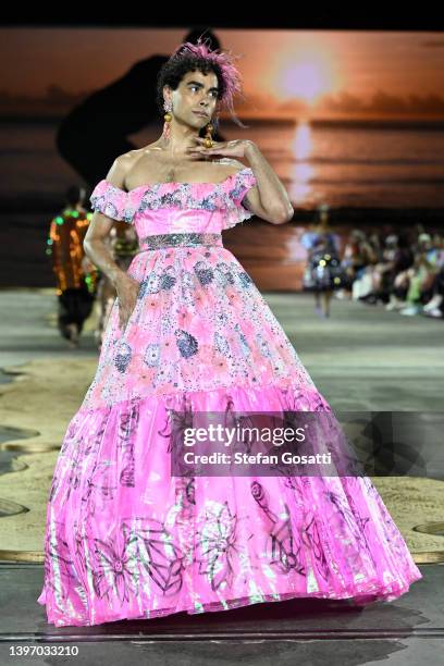 Model walks the runway in a design by Paul McCann during the First Nations Fashion + Design show during Afterpay Australian Fashion Week 2022 Resort...