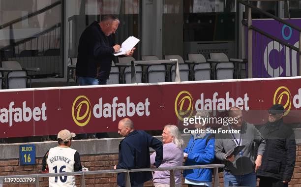 Durham Chairman Ian Botham signs autographs for fans during the LV= Insurance County Championship match between Durham and Glamorgan at The Riverside...