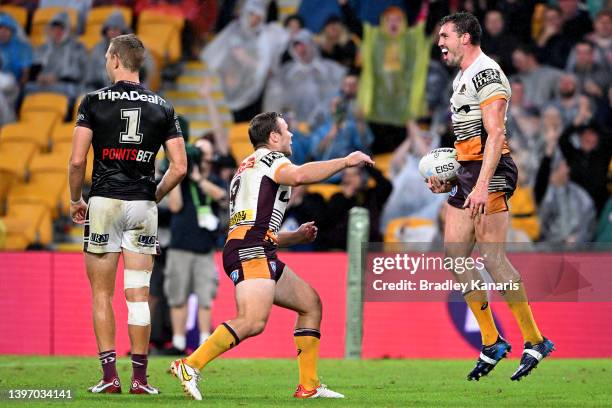 Corey Oates of the Broncos celebrates scoring a try during the round 10 NRL match between the Manly Sea Eagles and the Brisbane Broncos at Suncorp...