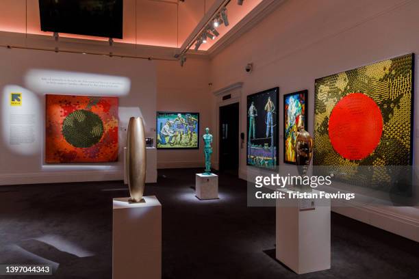 Works go on display at Sotheby's ahead of their sale in an auction to benefit families affected by the crisis in Ukraine, on May 13, 2022 in London,...
