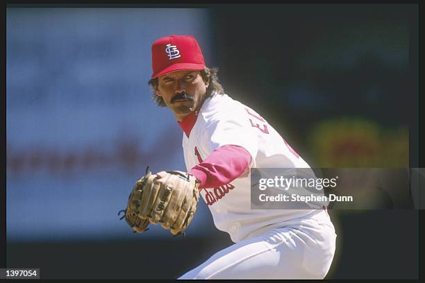 Pitcher Dennis Eckersley of the St. Louis Cardinals throws a pitch during a game against the Houston Astros at Busch Stadium in St. Louis, Missouri....