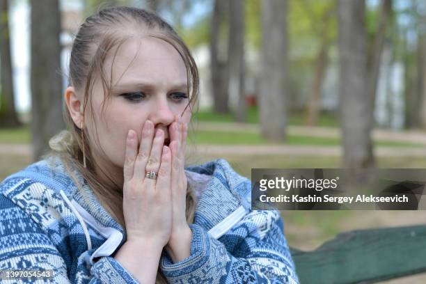 portrait of a sad woman. - woman head in hands sad stock pictures, royalty-free photos & images