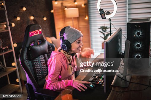 Girl plays video game online and streaming at home Girl plays video game online and streaming at home