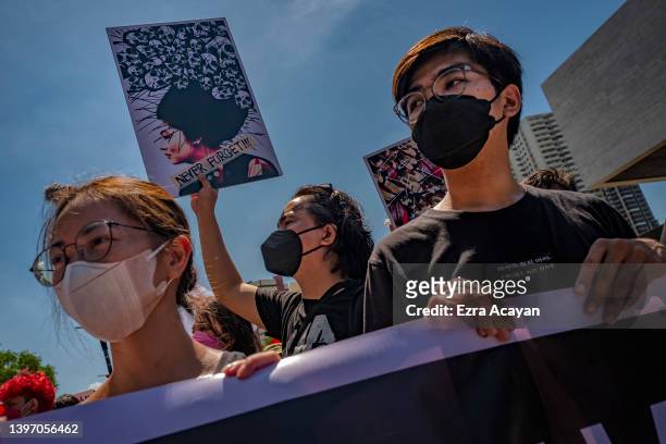 Filipinos take part in a protest against election results outside the Philippine International Convention Center, where votes are being canvassed, on...