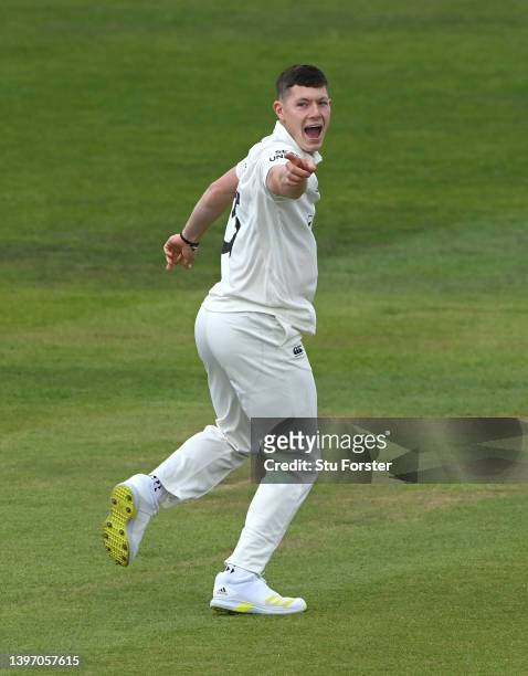 Durham bowler Matthew Potts celebrates after taking the wicket of Chris Cooke during day two of the LV= Insurance County Championship match between...