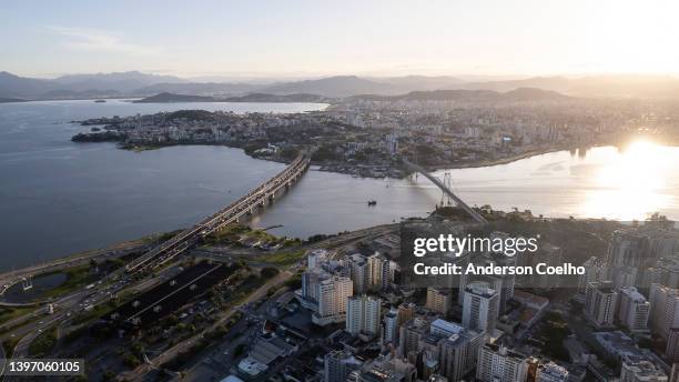 urban region in a sunset - florianopolis stock pictures, royalty-free photos & images